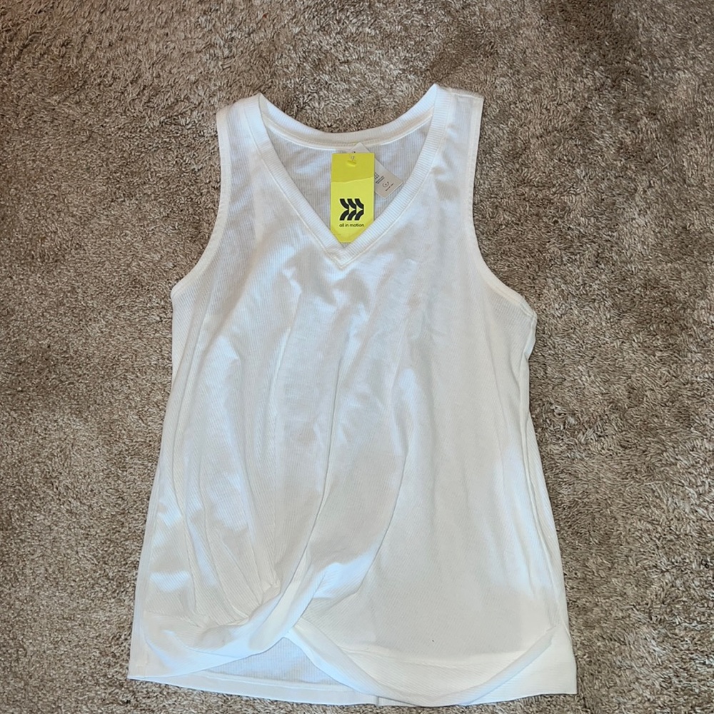 I’m selling a white sleeveless tank